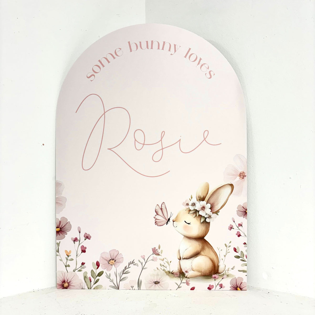 Some Bunny Loves You Easel Sign with cute bunny, butterflies, and floral design - personalised arch-shaped waterproof foamex welcome sign by Zebra Print Events