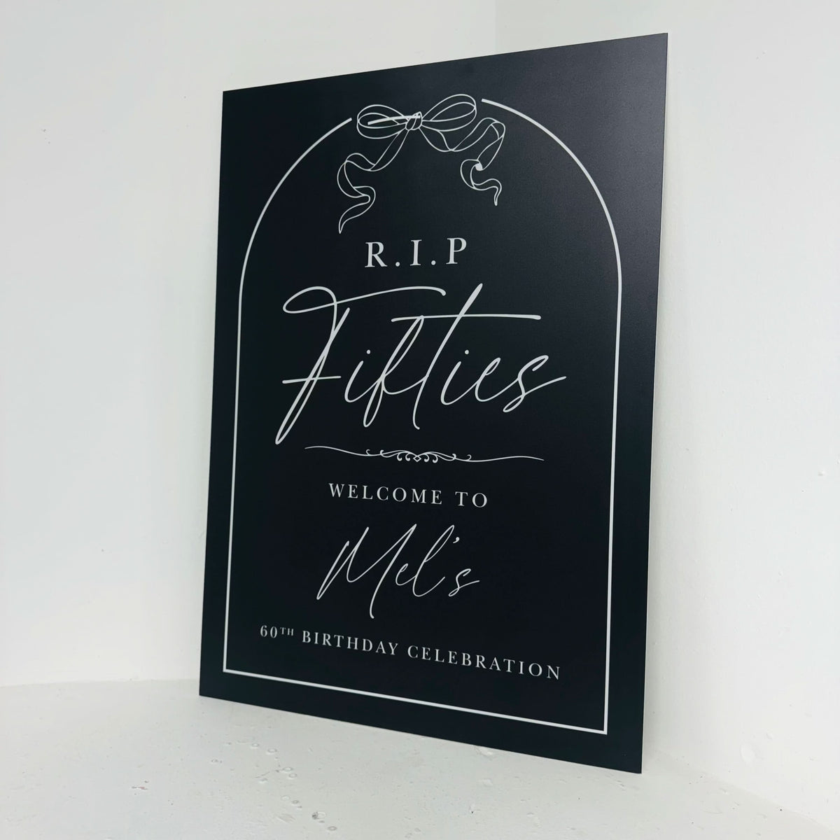 Personalised RIP Another Century milestone birthday easel sign close-up with black arch design and white script text - waterproof foamex party sign by Zebra Print Events
