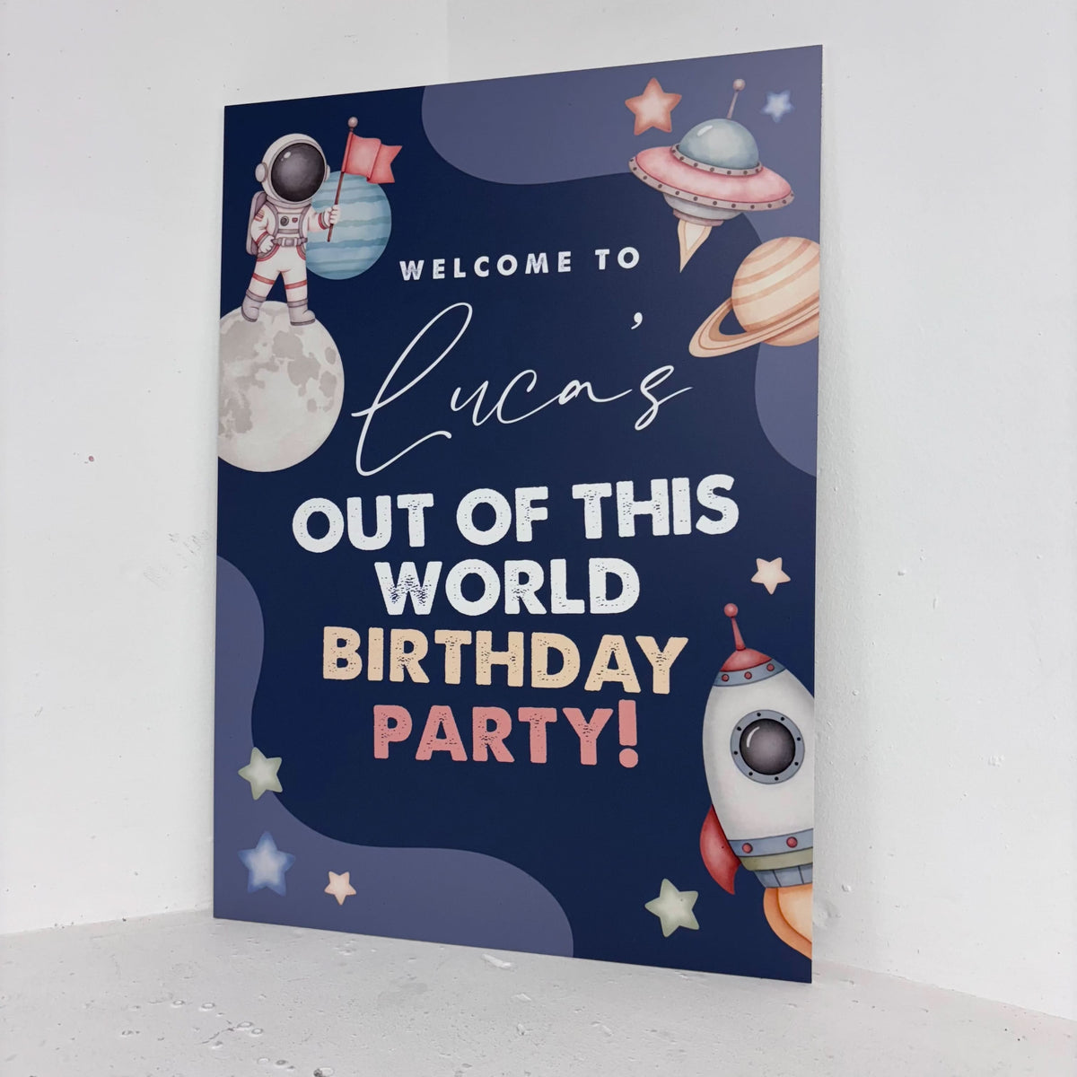 Out of This World easel sign angled view showing space-themed birthday design with personalised name on freestanding foamex board