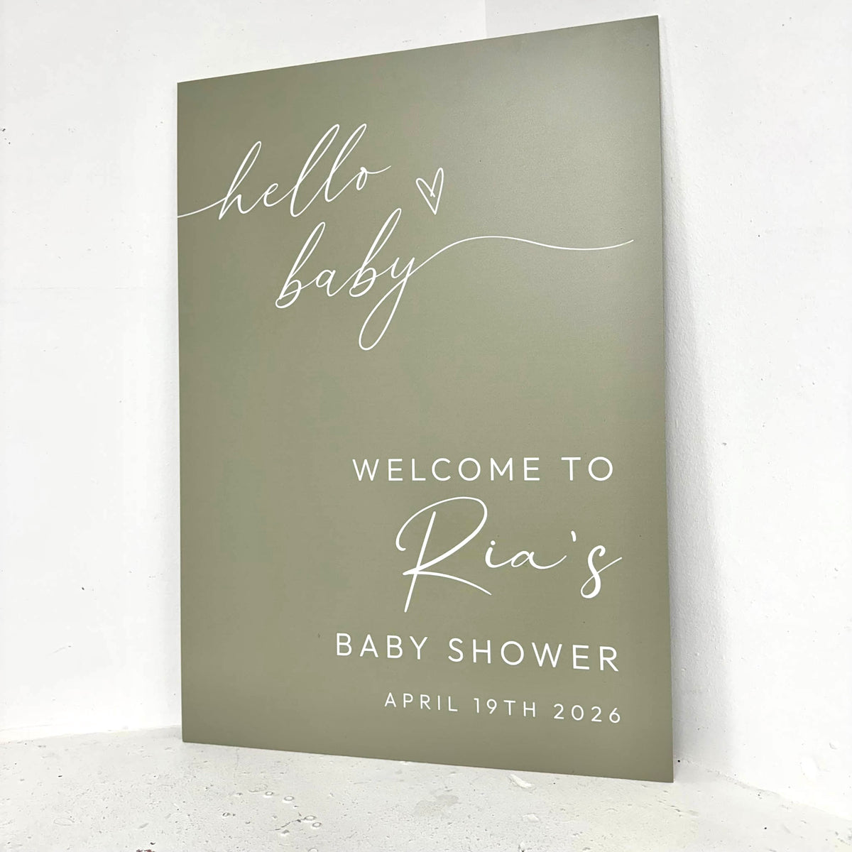 Close-up of Hello Baby shower foamex easel sign showing custom name and date personalisation