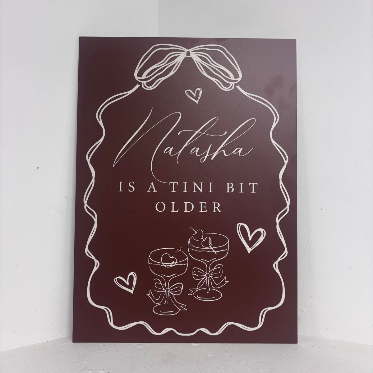 Tini Bit Older personalised birthday easel sign with elegant cocktail design and custom name on waterproof foamex board by Zebra Print Events