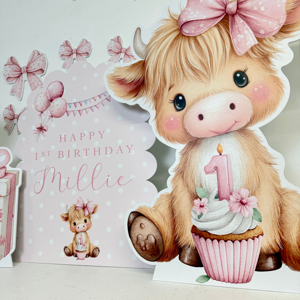 Sweet Little Moo mini cutout bundle featuring cute highland cow character with personalised birthday sign and cupcake prop, perfect for first birthday party decorations