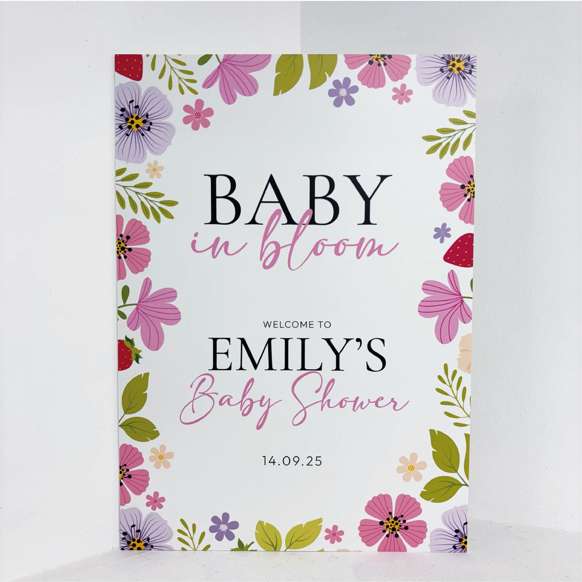 Baby in Bloom personalised baby shower easel sign with pink and purple floral design, featuring welcome text and custom name on waterproof foamex board