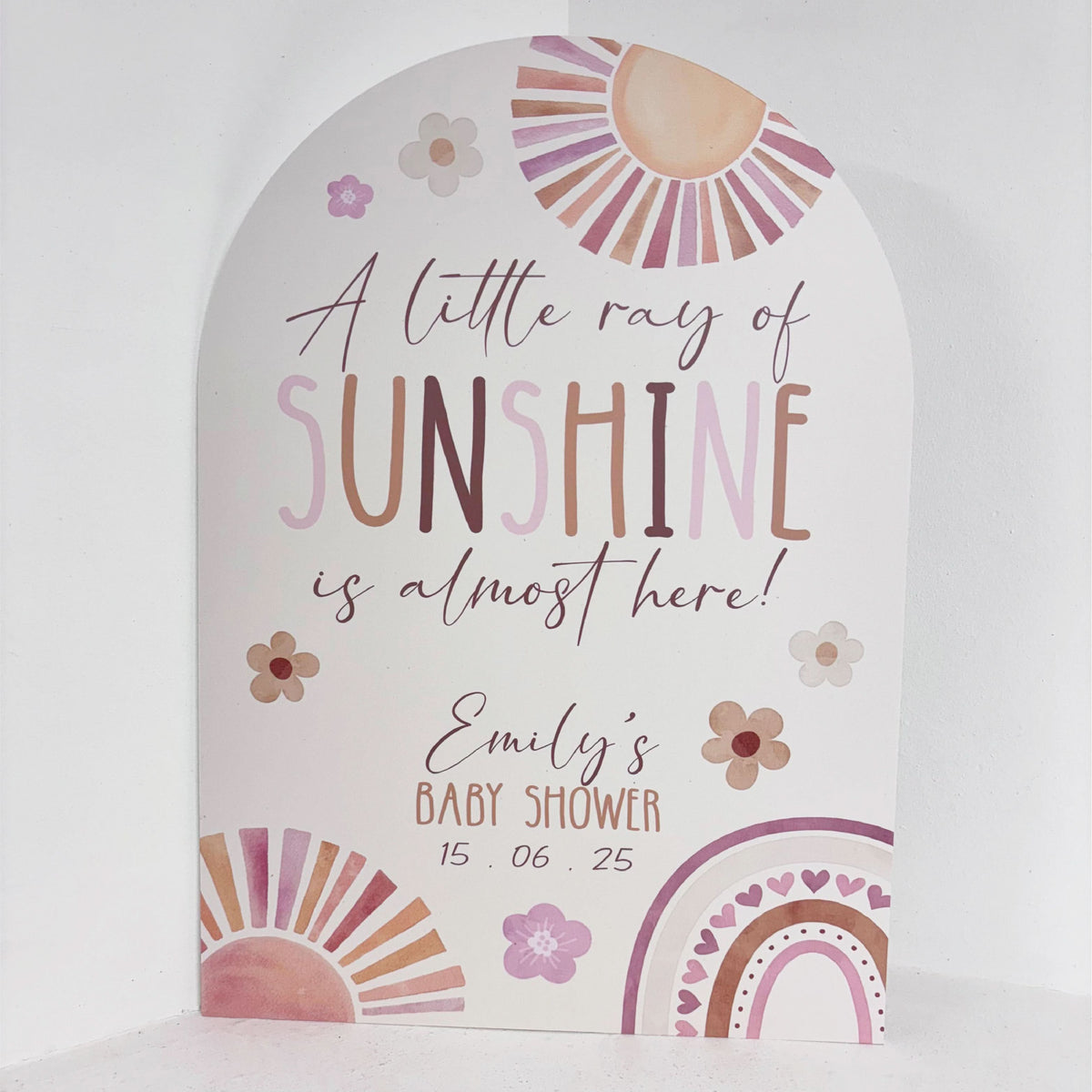A Little Ray of Sunshine personalised baby shower easel sign with boho rainbow, sunshine and floral design, featuring welcome text and custom name on waterproof foamex board