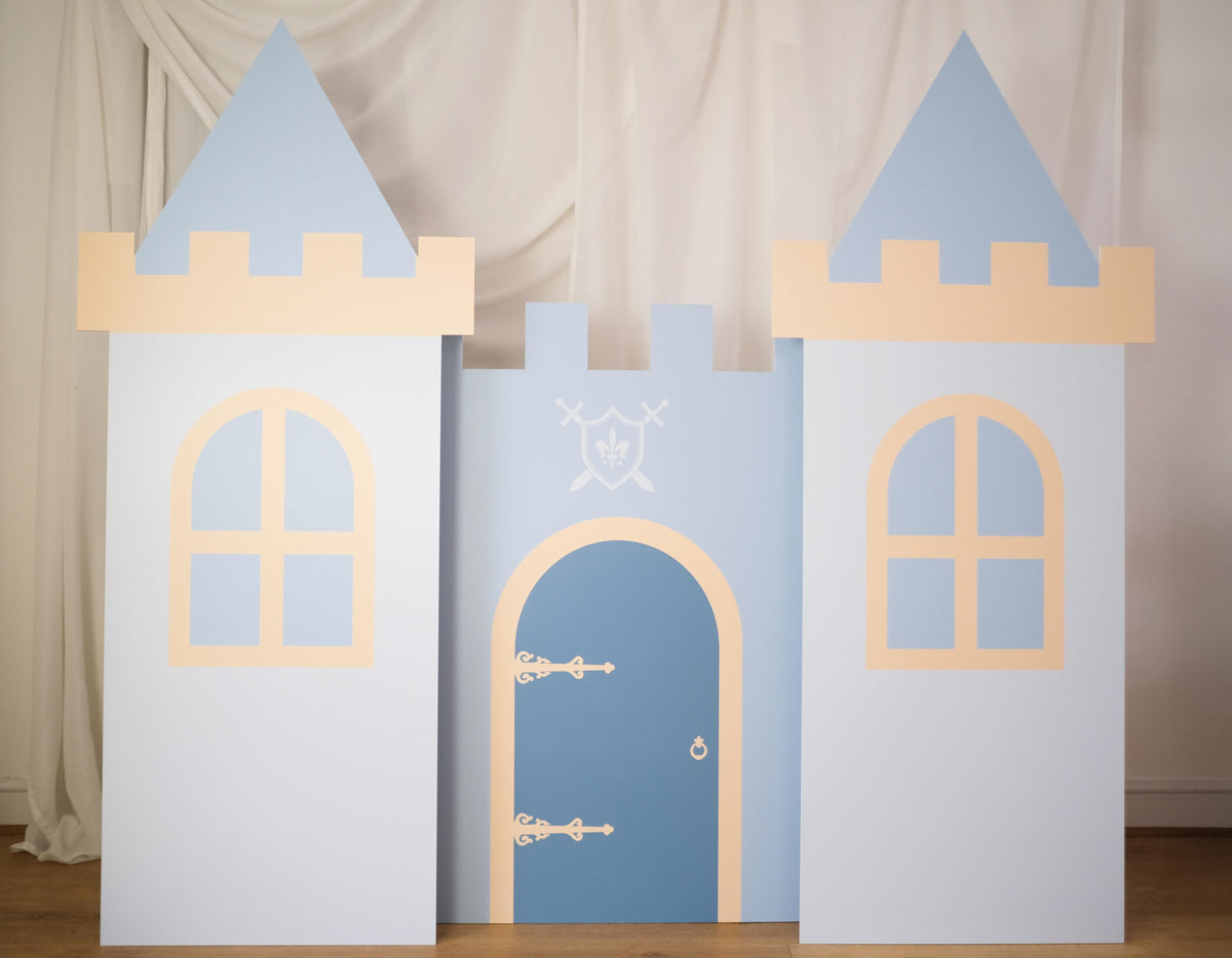 Knight Castle waterproof foamex castle set featuring blue doors, arched windows, battlements, and two side towers medieval knight party prop
