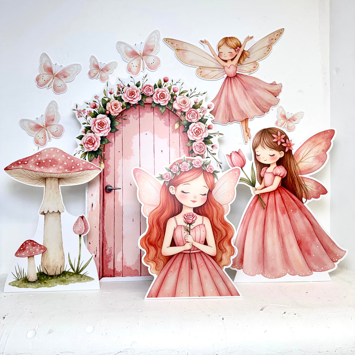 Mini Fairytale Princess party decoration bundle featuring waterproof foamex cutouts including a pink fairy door, fairy holding flower, and flying fairy with butterflies and mushrooms