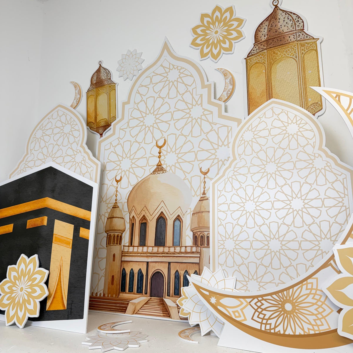 Eid Bundle featuring personalised waterproof foamex cutouts including Kaaba, mosque, crescent moons, gold lanterns, and Islamic geometric pattern sail boards Eid party decorations