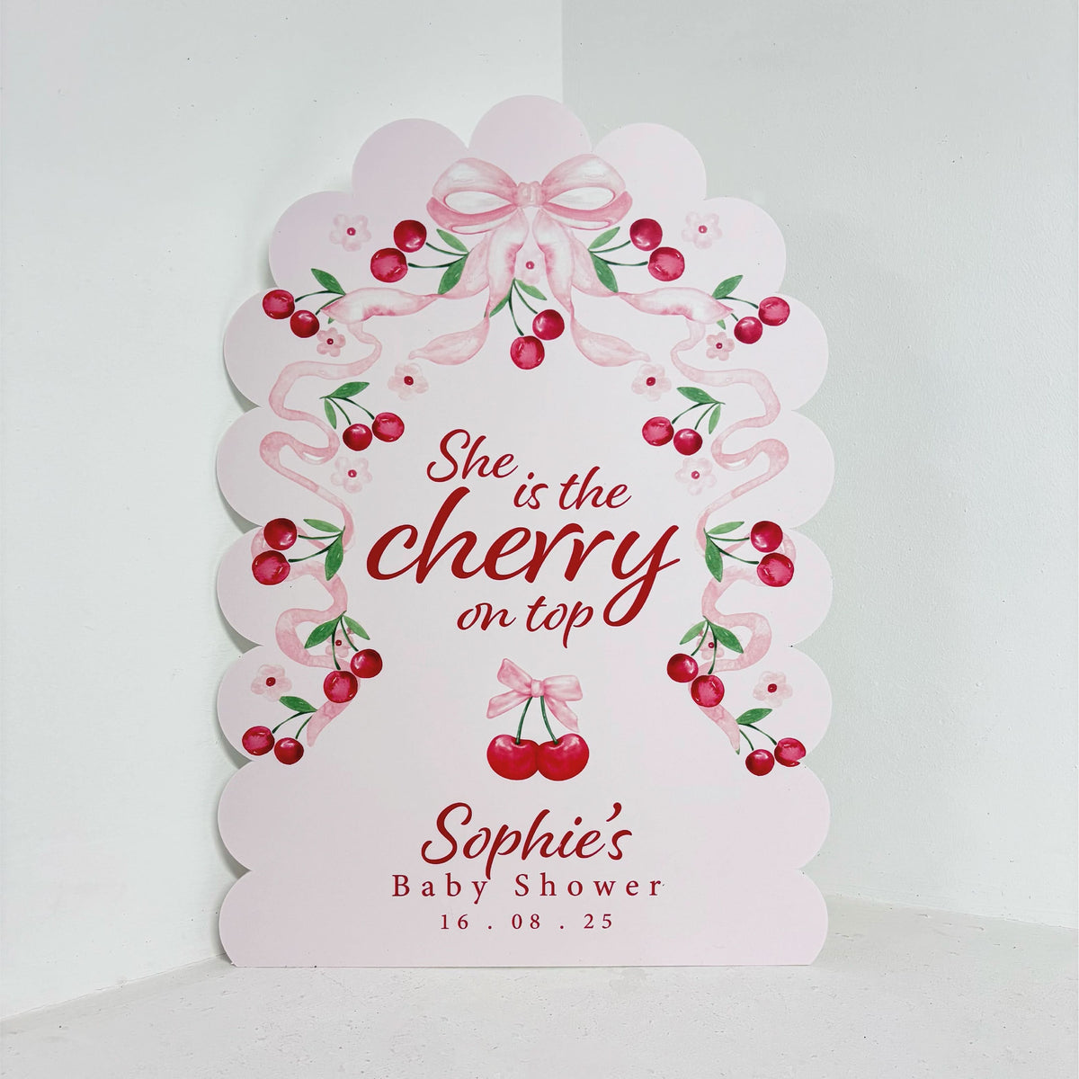 Cherry On Top personalised baby shower easel sign with pink cherry and ribbon design, featuring custom name and date on waterproof foamex board