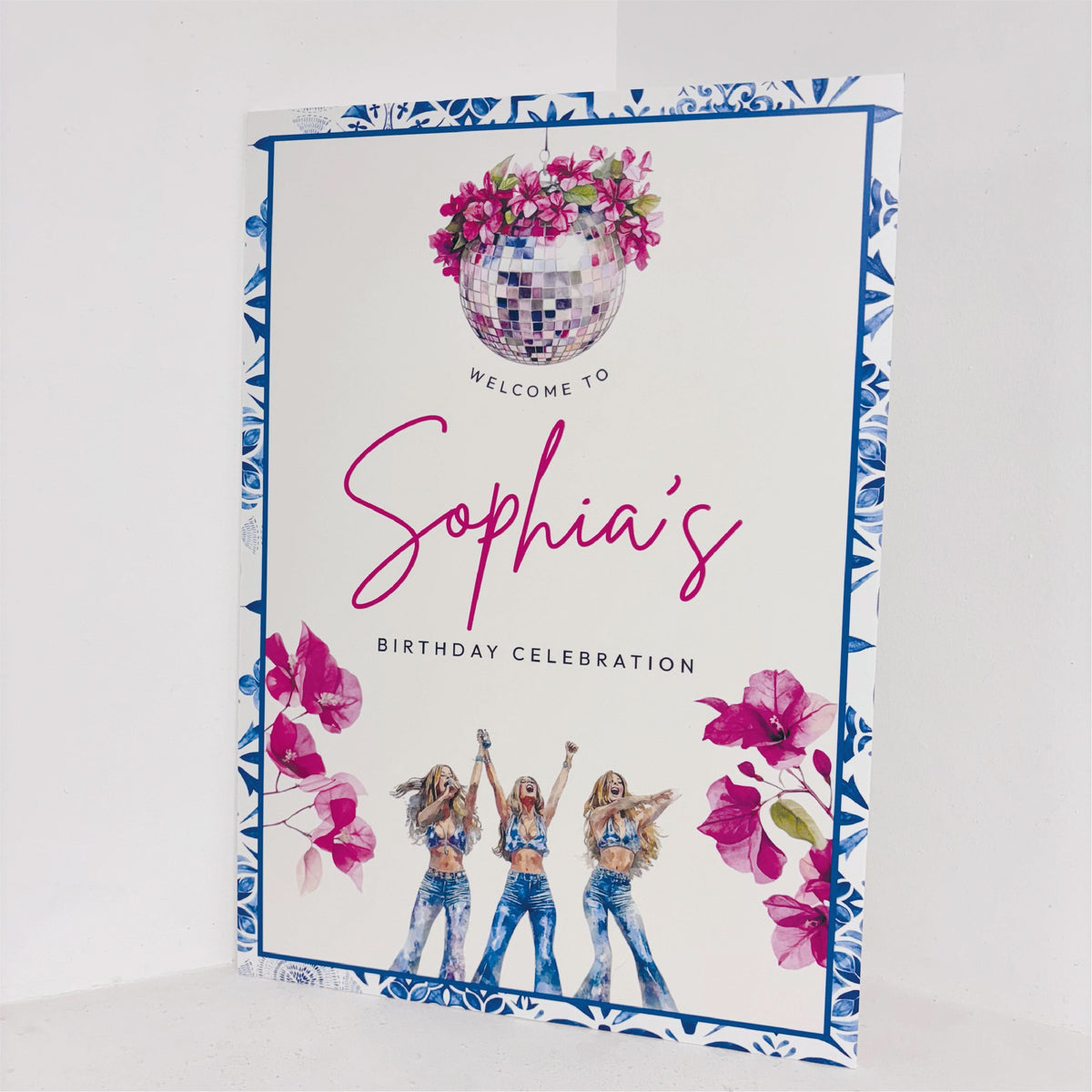 Angled view of Greek Birthday personalised birthday celebration welcome sign on waterproof foamex board with vibrant Mamma Mia-inspired design and floral details