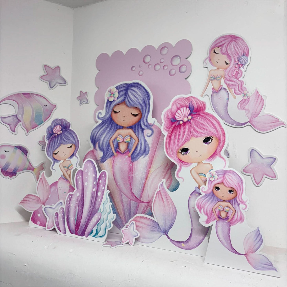 Dreamy Mermaids Bundle featuring personalised waterproof foamex cutouts including pink and purple mermaids, scalloped sail board, shells, starfish, and coral decorations